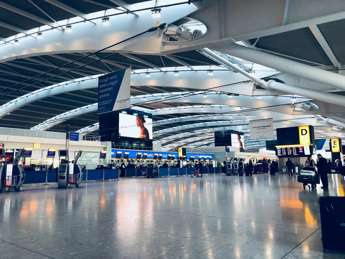 The inside of the terminal at Heathrow terminal 5 showing the check-in desks